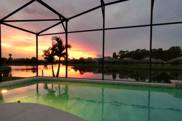 Pool at sunset with pool light on